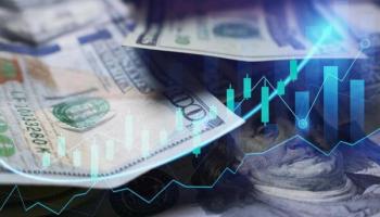 Descubre cómo invertir en divisas. En la foto hay billetes de 100 dólares.